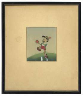 ’’Pinocchio’’ Animation Cel From the 1940 Disney Classic Film, Showing Pinocchio Holding the Apple for His Teacher -- With Hand Painted Set-up by Courvoisier | Nate Sanders