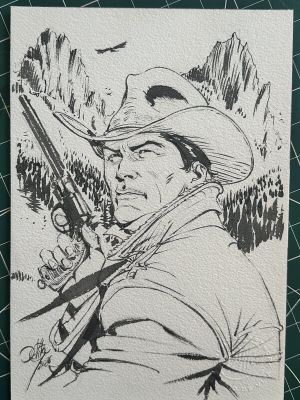 Giulio de Vita | Portrait de Tex avec arme à feu et decor montain | 2DGalleries