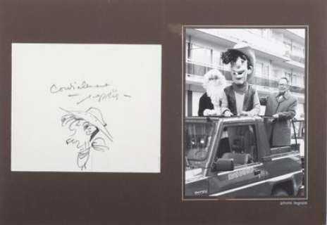 Morris, Maurice de Bevere Dit (1923-2001) | Dédicace au feutre noir (1987), vue de profil de la tête de Lucky Luke. Dédicace collée Ã  côté du ph… | Stanley’s Auction