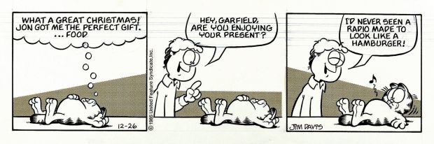 Jim Davis | Garfield ’Christmas’ Holiday Daily Strip (Garfield Accidentally Eats His Christmas Gift... a Hamburger.....Radio! Lol!) 12-26-1985 | Romitaman